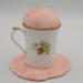 This shows the backside of the cup with different flowers. This shows the backside of the cup with different flowers.